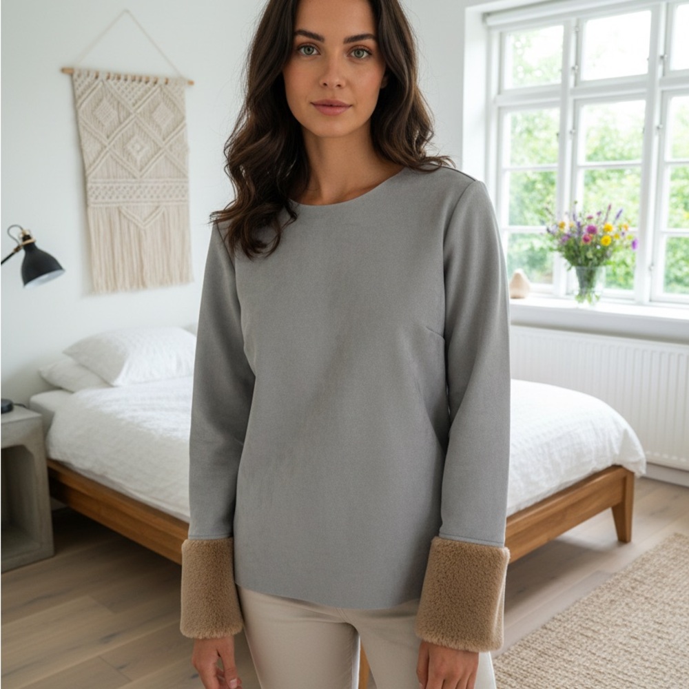 Ultra soft faux suede top with faux fur trim